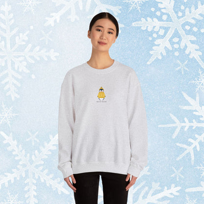 Sweater Weather Unisex Crewneck Sweatshirt - Staying Warm and Fuzzy. Small centered Penguin design wearing a yellow Sweater with text under "sweater weater"