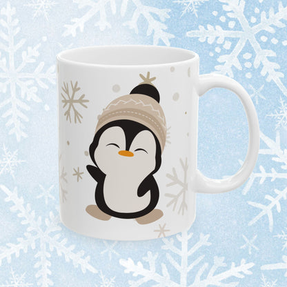 Penguin Mug - Cute Ceramic white mug with a cute penguin design wearing a winter hat. On the other side of the mug there is a text saying "Cute by nature".