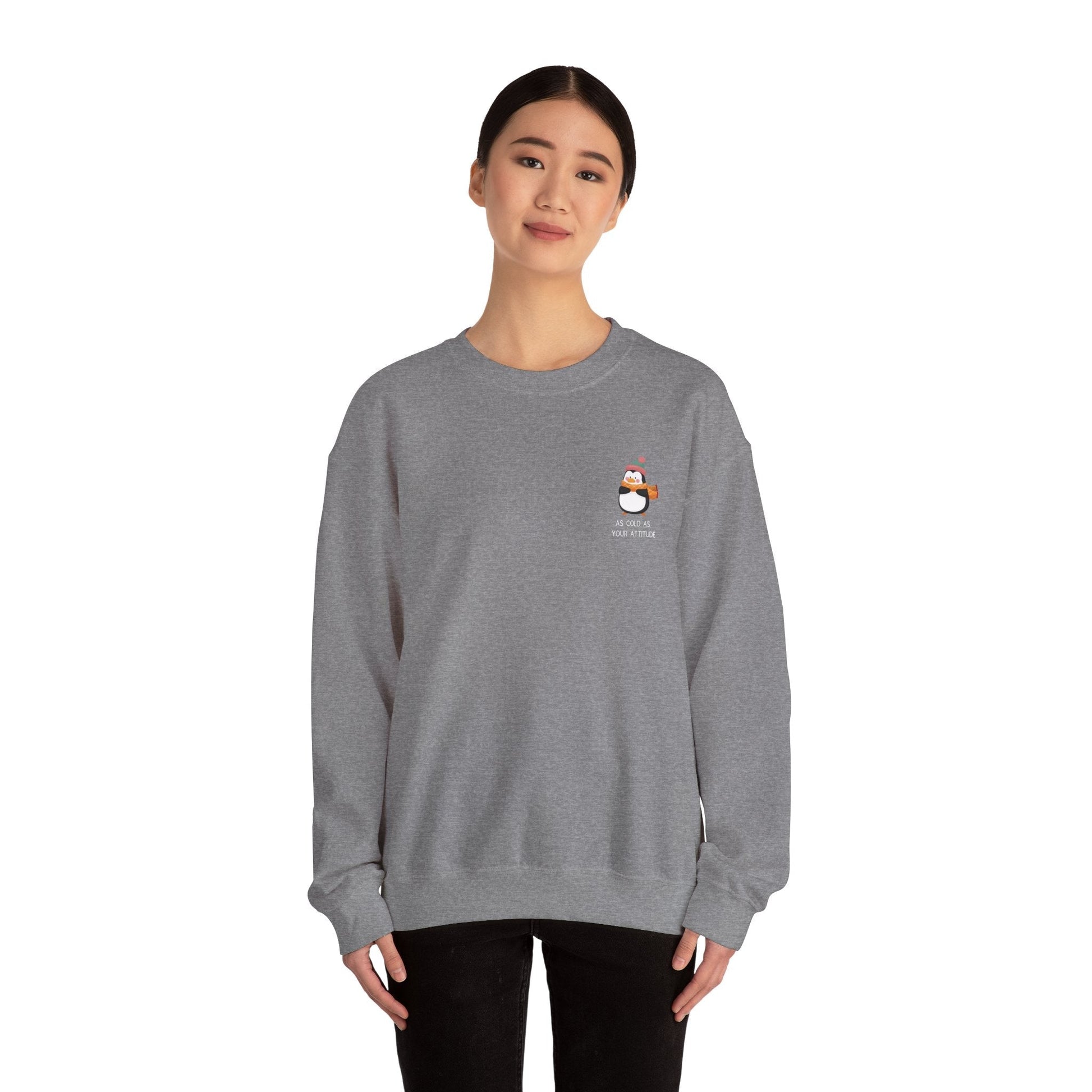 Funny Winter Sweatshirt - Penguin with an Attitude, Unisex Sweatshirt. Small Penguin design on the side with winter clothing, and text 'as cold as your attitude'