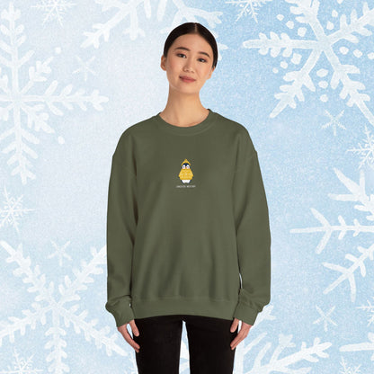 Sweater Weather Unisex Crewneck Sweatshirt - Staying Warm and Fuzzy. Small centered Penguin design wearing a yellow Sweater with text under "sweater weater"