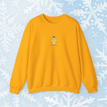 Sweater Weather Unisex Crewneck Sweatshirt - Staying Warm and Fuzzy. Small centered Penguin design wearing a yellow Sweater with text under "sweater weater"